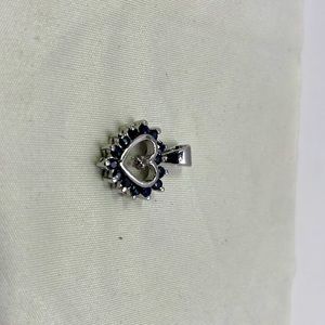 Lab grown sapphire heart pendant in silver